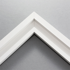 This simplistic yet modular white frame is designed for metal prints, acrylic prints and dry mounts. This smart design features a minimalist stepped profile that serves as a floater frame or a standard picture frame.

For the floating effect, the print can be attached on top of the inner step of the frame, without sacrificing the artwork edges.

This frame can also be used as standard picture frame. The lowered center paired with slightly raised outer lip creates a frame within a frame effect. However, due to the inner most lip of the frame, a fraction of the artwork will be hidden. But, this can be avoided with a linen liner combo.