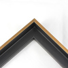 This small, L-shaped floating canvas frame in matte black features a brushed gold face.
1.5 " depth from wall, and .5 " width: ideal for medium and large canvases on thin (3/4 " deep) stretcher bars. Pair this frame with a painting or Giclée print for an authentic fine art display.
*Note: These solid wood, custom canvas floaters are for stretched canvas prints and paintings, and raised wood panels.
