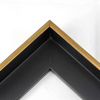 This Medium, L-shaped floating contemporary canvas frame in matte black features a thin brushed gold face.
*Note: These solid wood, custom canvas floaters are for stretched canvas prints and paintings, and raised wood panels.