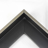 This Medium, L-shaped floating contemporary canvas frame in matte black features a thin brushed Silver face.
*Note: These solid wood, custom canvas floaters are for stretched canvas prints and paintings, and raised wood panels.