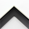 Elegant 1 " deep floater frame. The silver face and black interior have a satin finish.
This slim molding is best suited for framing small to medium works of art.