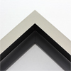 This large, L-shaped floating contemporary canvas frame in warm silver features a wide flat face.
*Note: These solid wood, custom canvas floaters are for stretched canvas prints and paintings, and raised wood panels.