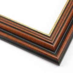 This stepped, reverse scoop frame with raised outer edge features a walnut wash that highlights the natural wood grain.  The recesses of the profile are matte black, with a cracked gold foil on the inner lip.

1.75 " width: ideal for medium size images.  A wide variety of photographs, paintings and prints will be enhanced within this unique frame.